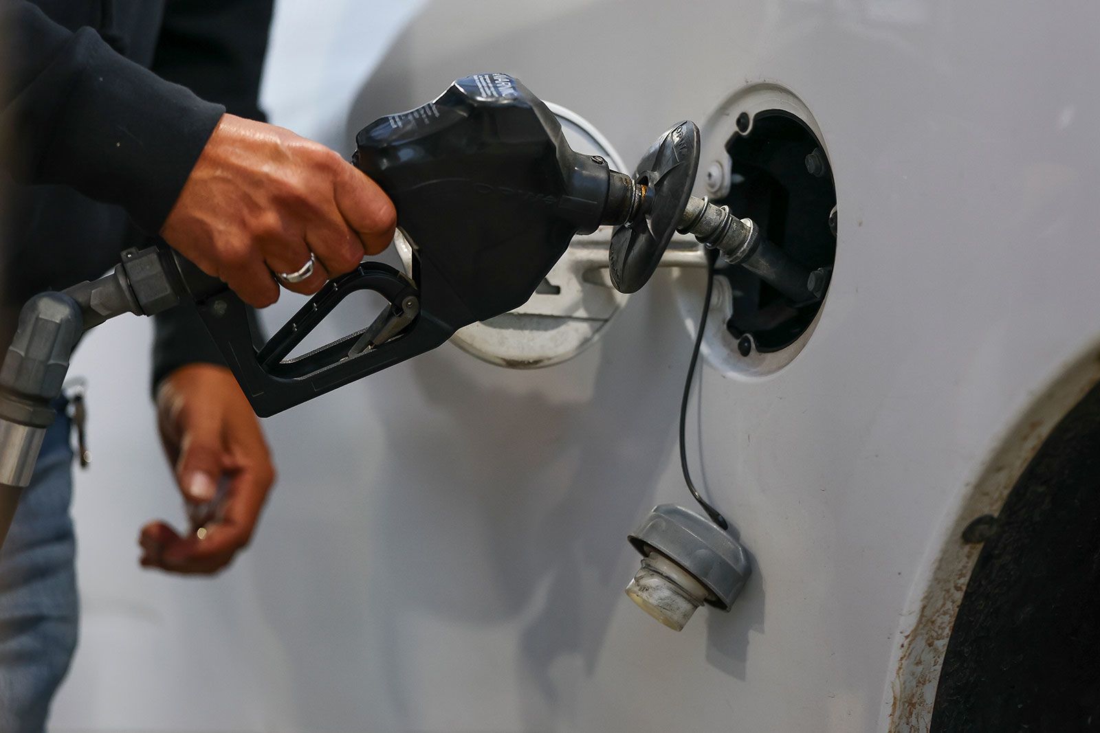 <i>Aaron M. Sprecher/AP via CNN Newsource</i><br/>A driver fills their gas tank with fuel at an Exxon gas station in Houston on March 19.