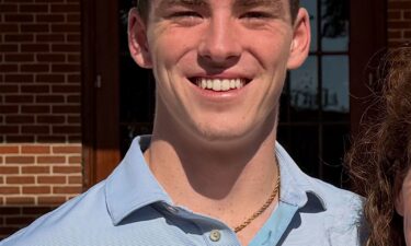 Investigators recover a body on the beach of Somorrostro following an underwater search in Barcelona