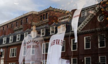 Harvard University merchandise in a store window across from campus in Cambridge