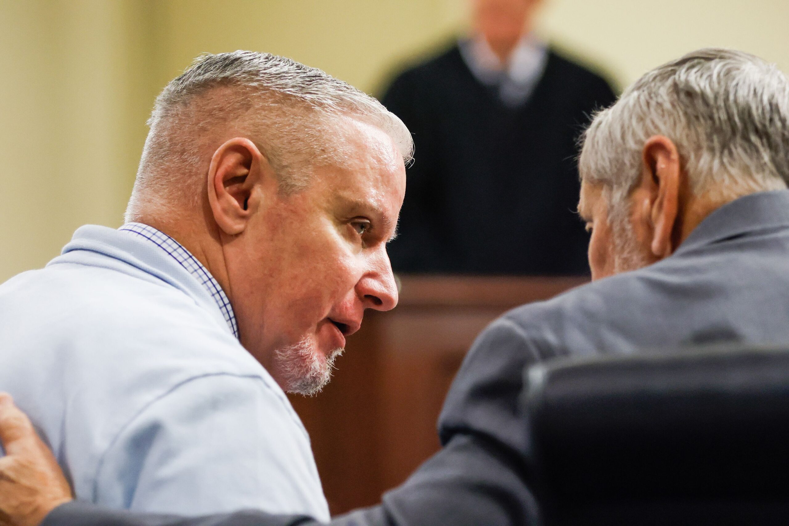 Colin Gray listens to his attorney during closing arguments in his trial at Barrow County Courthouse in Winder, GA, on Monday, March 2.
