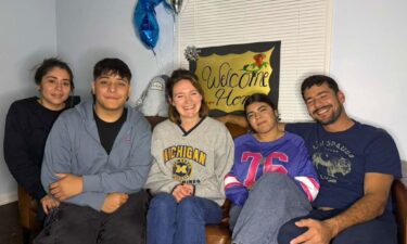 Kristen Schoettle (center) poses with Antony (second left)