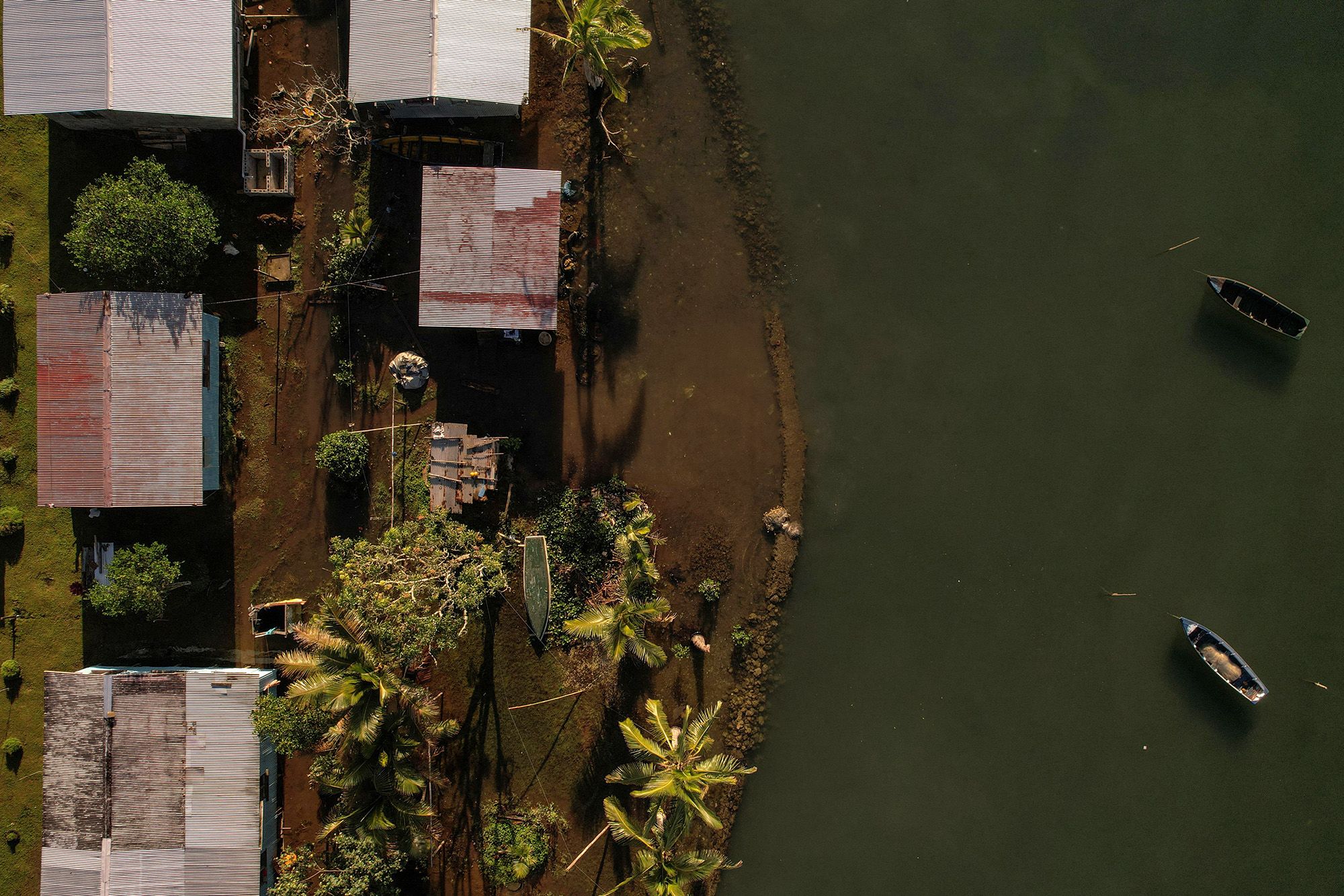 <i>Sirachai Arunrugstichai/Getty Images via CNN Newsource</i><br/>A car is seen damaged by the flood in Hat Yai City on November 28