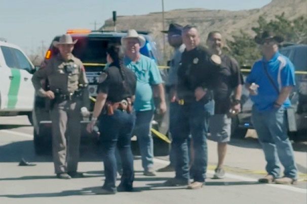 <i>Courtesy Olivia Siqueiros via CNN Newsource</i><br/>Law enforcement officers surround a crashed vehicle after pursuing the driver in a car chase along Interstate 10 near Van Horn