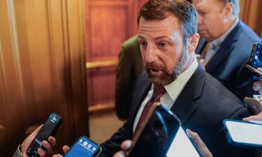 Sen. Markwayne Mullin speaks to members of the media near the Senate chamber floor at the US Capitol on March 5