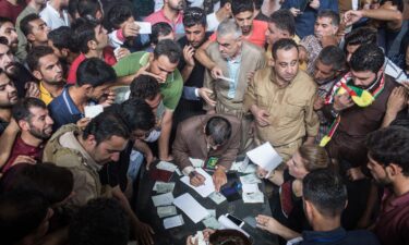 Syrian Kurds fleeing areas north of Aleppo arrive in Tabqa