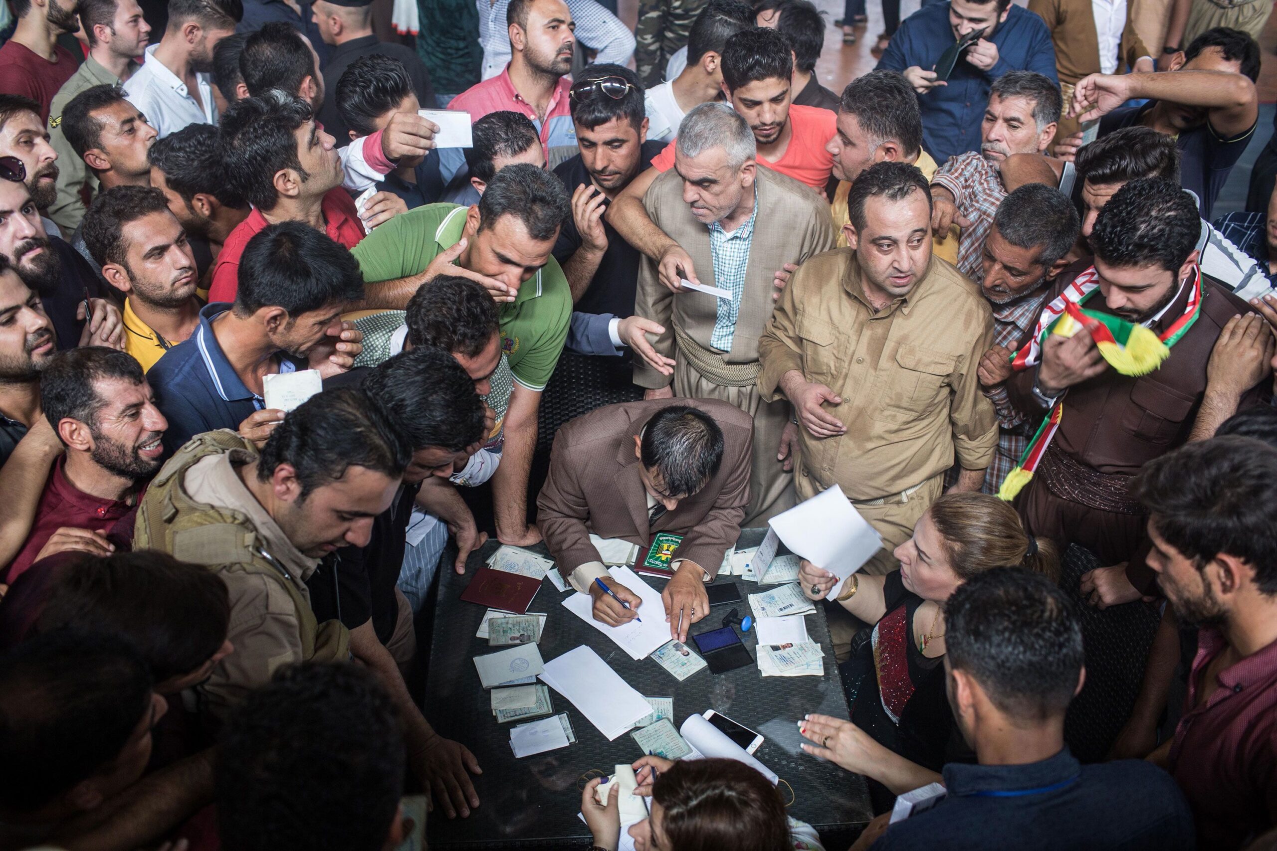 <i>Delil Souleiman/AFP via Getty Images via CNN Newsource</i><br/>Syrian Kurds fleeing areas north of Aleppo arrive in Tabqa