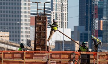 Workers at the Riverfront Development project along the Trinity River in Dallas