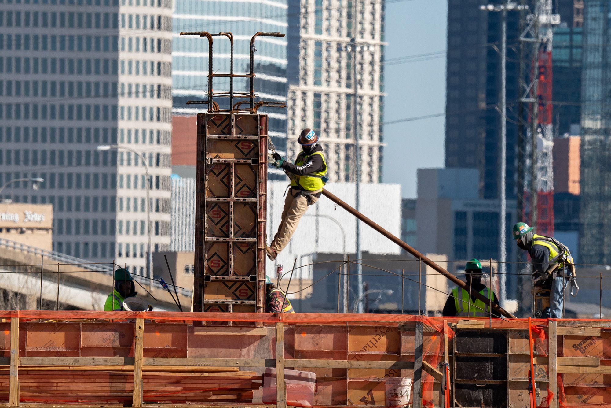 <i>Jonathan Johnson/Bloomberg/Getty Images via CNN Newsource</i><br/>Workers at the Riverfront Development project along the Trinity River in Dallas