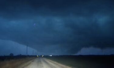 Lightning illuminates a deadly tornado near Fairview
