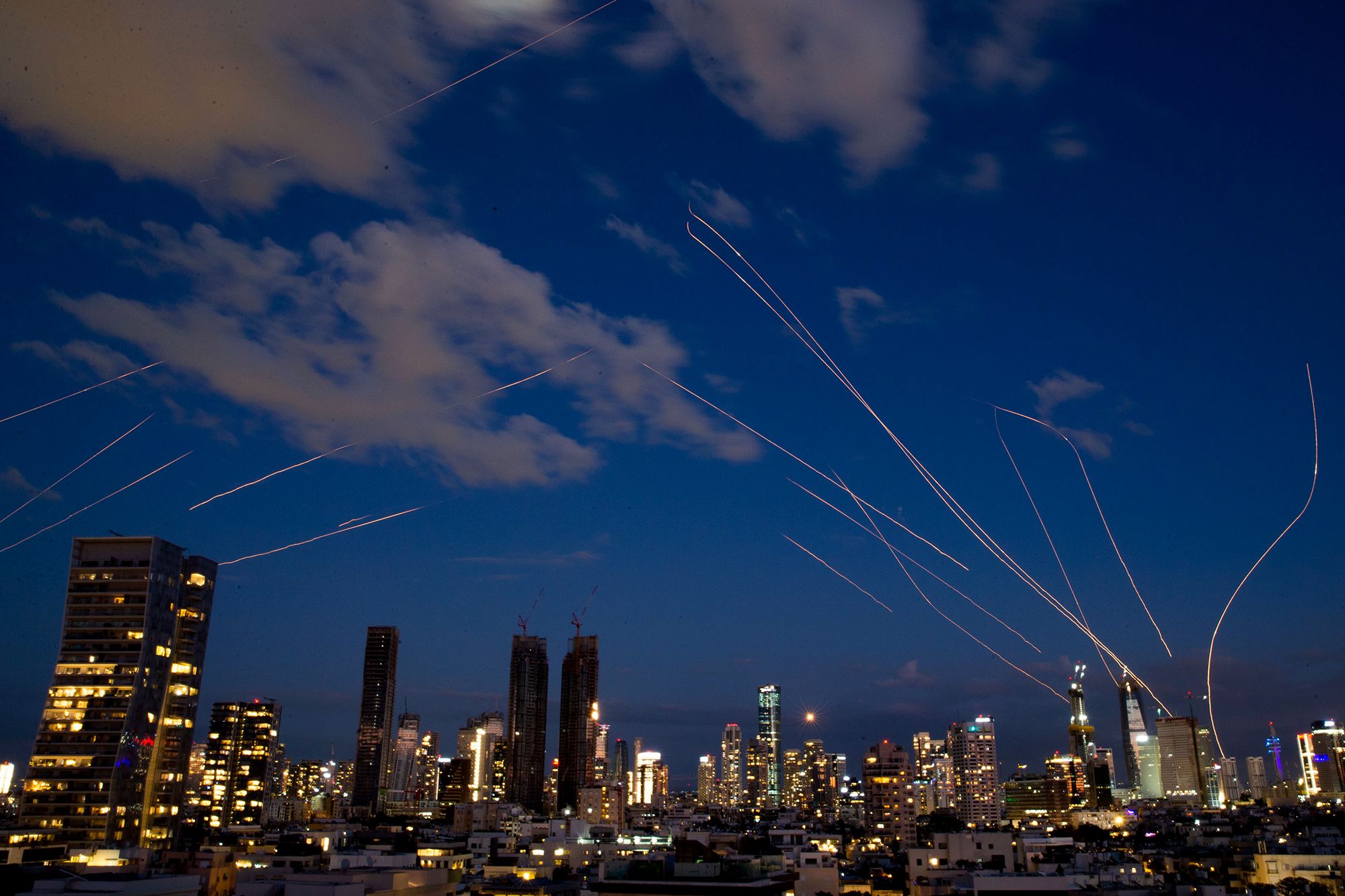 <i>Chen Junqing/Xinhua/Getty Images via CNN Newsource</i><br/>This long-exposure photo shows flare trails of the interceptor missiles launched from Israeli air defense systems in Tel Aviv