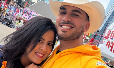 Estefany Rodriguez poses for a photo with her husband Alejandro Medina.