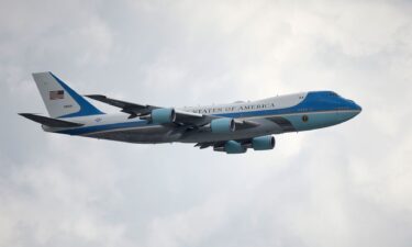 Democratic presidential hopeful Sen. Barack Obama and his wife Michelle Obama step off their plane after arriving at Minneapolis-Saint Paul International Airport in June 2008.