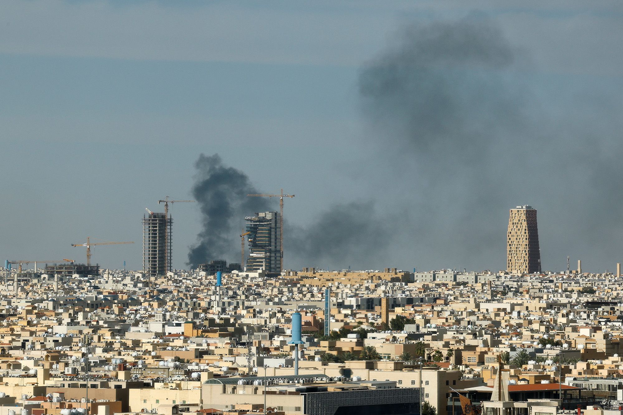 <i>Stringer/Reuters via CNN Newsource</i><br/>Smoke rises above the city