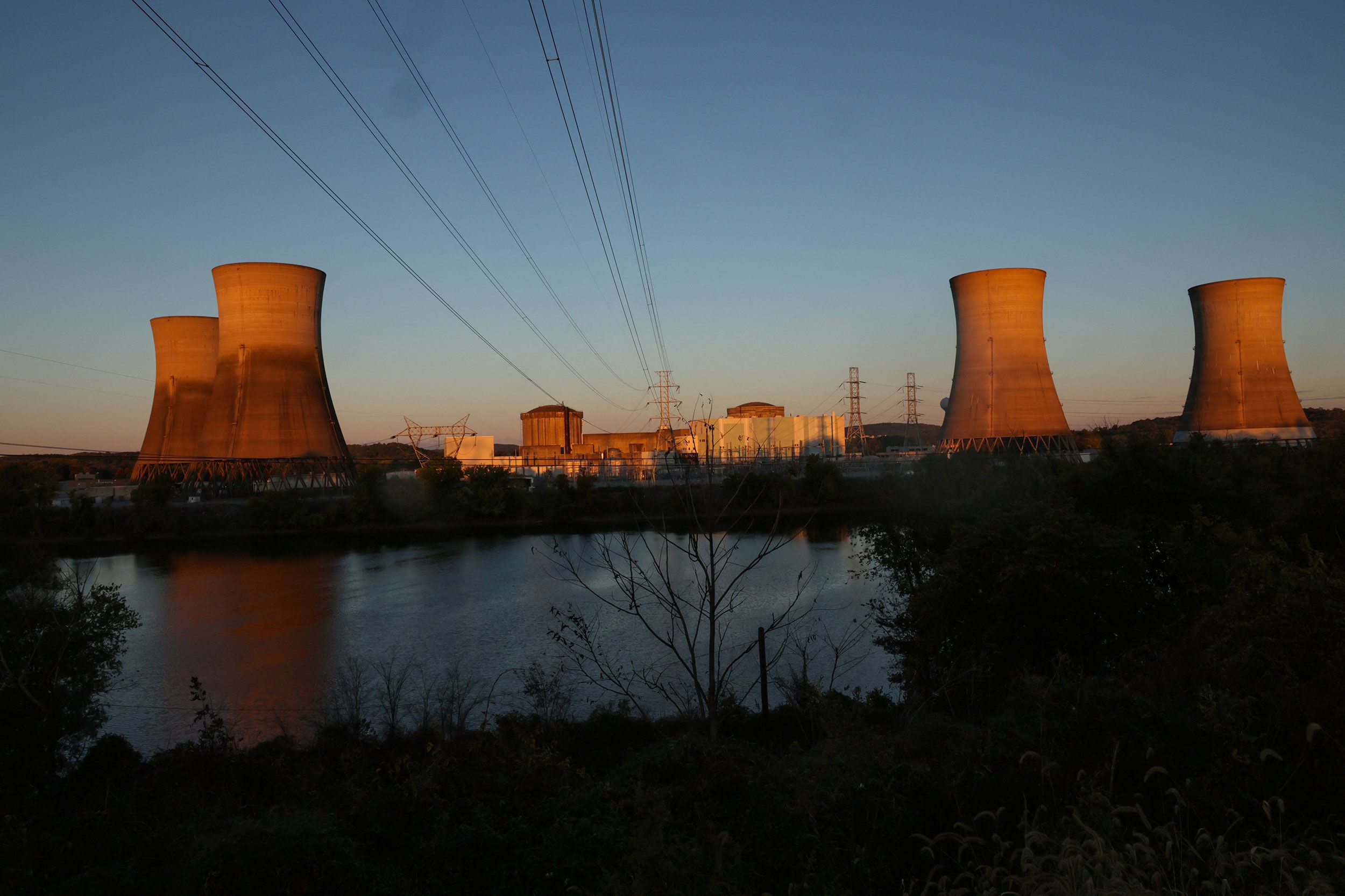 <i>Win McNamee/Getty Images via CNN Newsource</i><br/>President Donald Trump signs an executive order regarding the Nuclear Regulatory Commission in the Oval Office of the White House in May 2025.