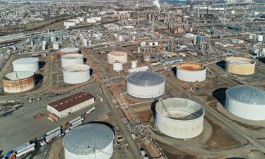 The Galaxy Globe bulk carrier and the Luojiashan tanker sit anchored at Muscat