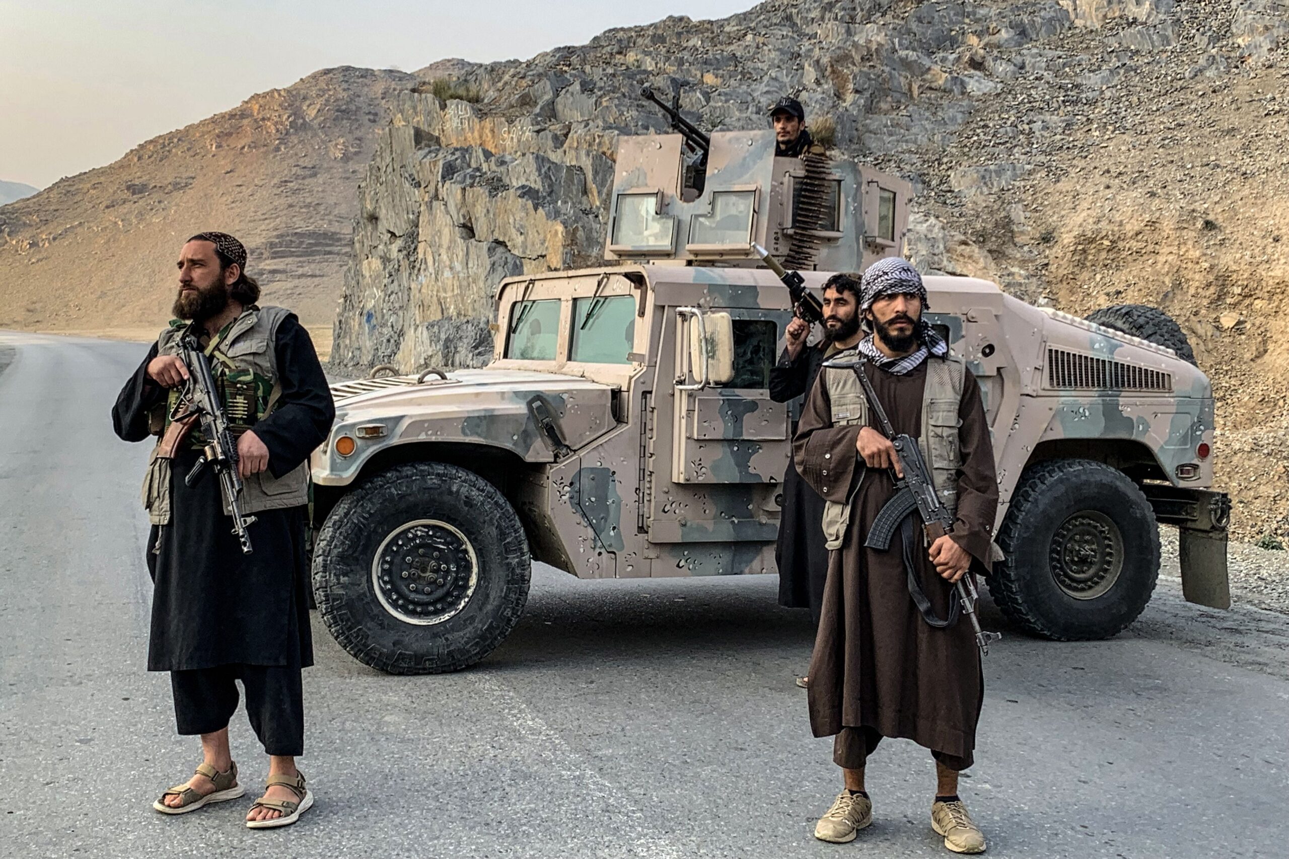 <i>Aimal Zahir/AFP/Getty Images via CNN Newsource</i><br/>Taliban security personnel stand guard near the Torkham border crossing between Afghanistan and Pakistan in the Nangarhar province