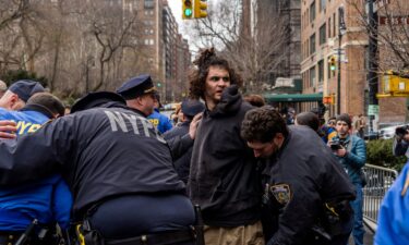 New York City Mayor Zohran Mamdani and Police Commissioner Jessica Tisch walk out of Gracie Mansion before speaking to reporters on Monday.