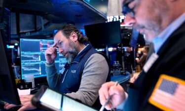Traders work on the floor at the New York Stock Exchange Tuesday.