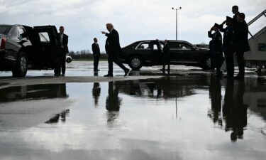 President Donald Trump steps off Air Force One upon arrival at Cincinnati/Northern Kentucky International Airport in Hebron