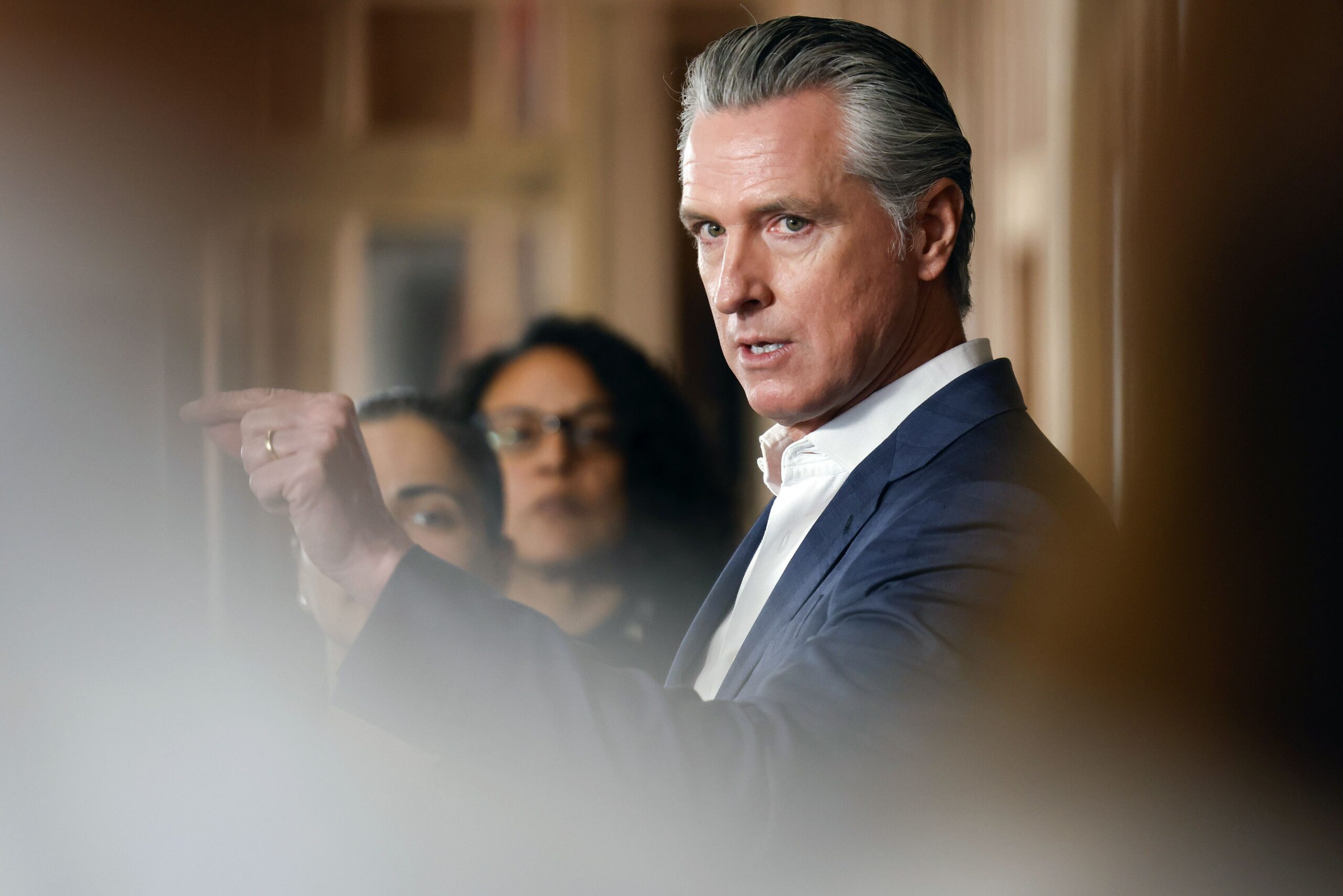 <i>San Francisco Chronicle/Hearst/Getty Images via CNN Newsource</i><br/>Governor Gavin Newsom speaks alongside local and state leaders during a press conference at BACS REGIS Center in Hayward