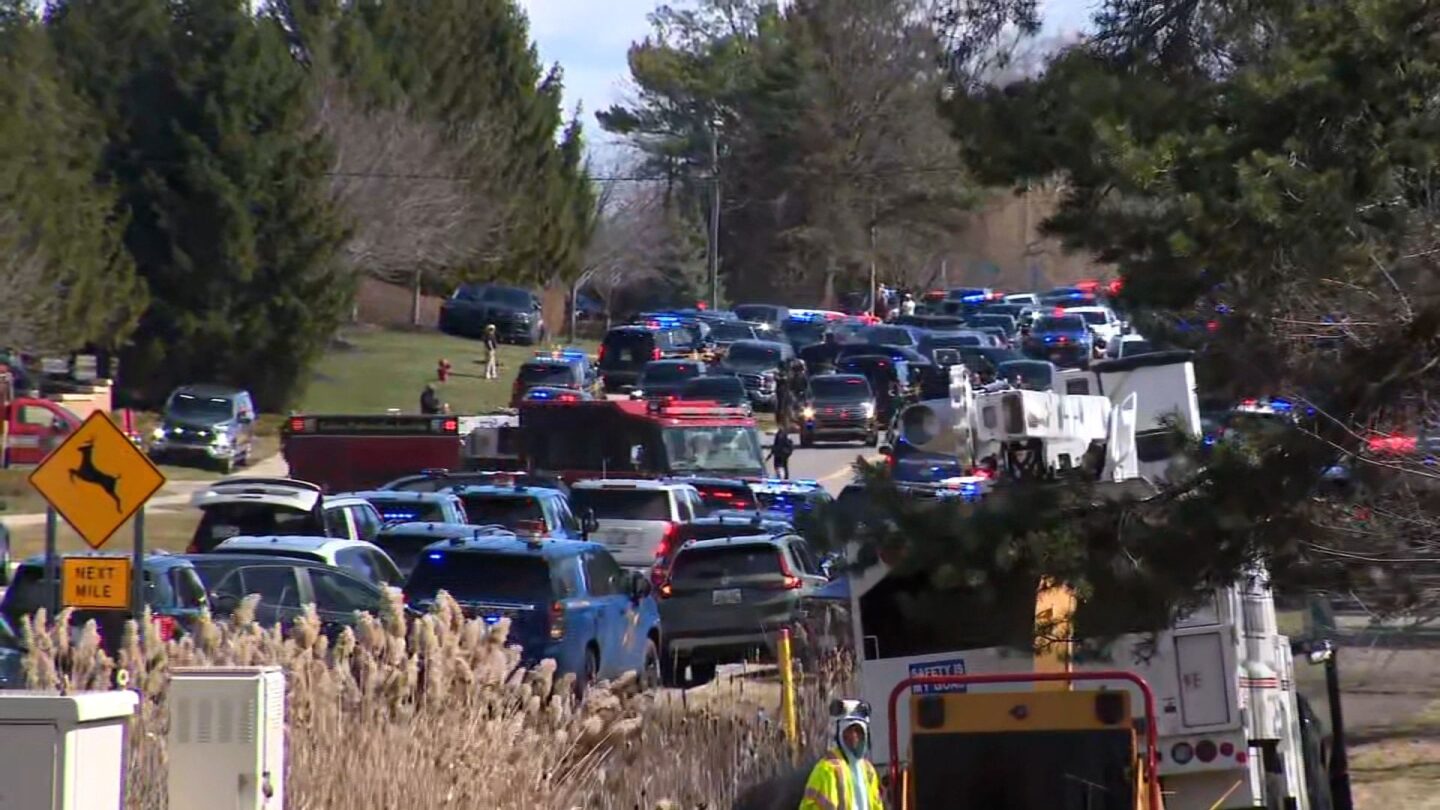 <i>WDIV via CNN Newsource</i><br/>Emergency personnel respond to a reported shooting in West Bloomfield Township