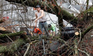 A home is heavily damaged after being hit by a tornado in Lake Village