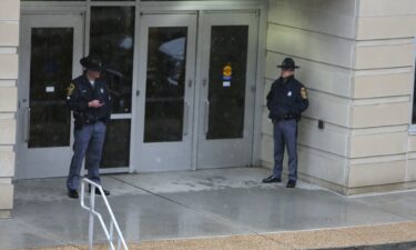 Police arrive outside Old Dominion University's campus after reports of an active shooter on March 12