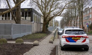 A photograph taken on March 14 shows a police car parked outside a Jewish school