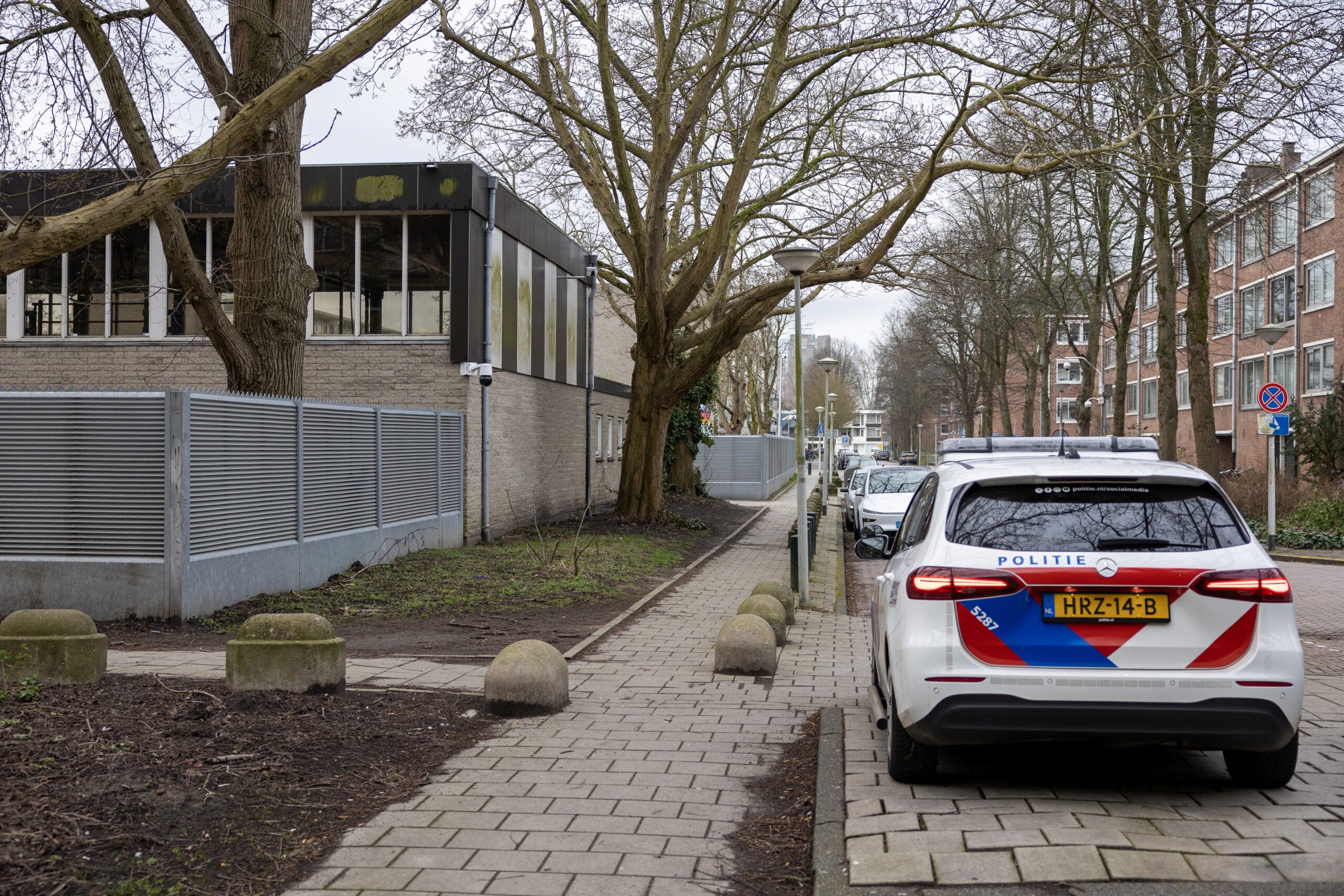 <i>Michel Van Bergen/ANP/AFP/Getty Images via CNN Newsource</i><br/>A photograph taken on March 14 shows a police car parked outside a Jewish school