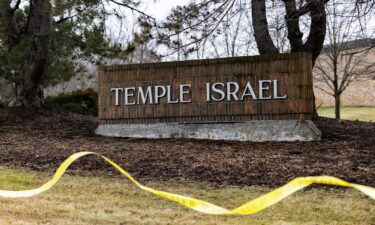 Smoke rises from Temple Israel on March 12.