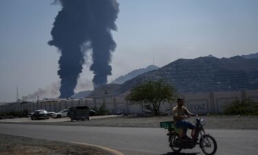 US President Donald Trump speaks to reporters before boarding Air Force One as he departs Joint Base Andrews in Maryland on March 13