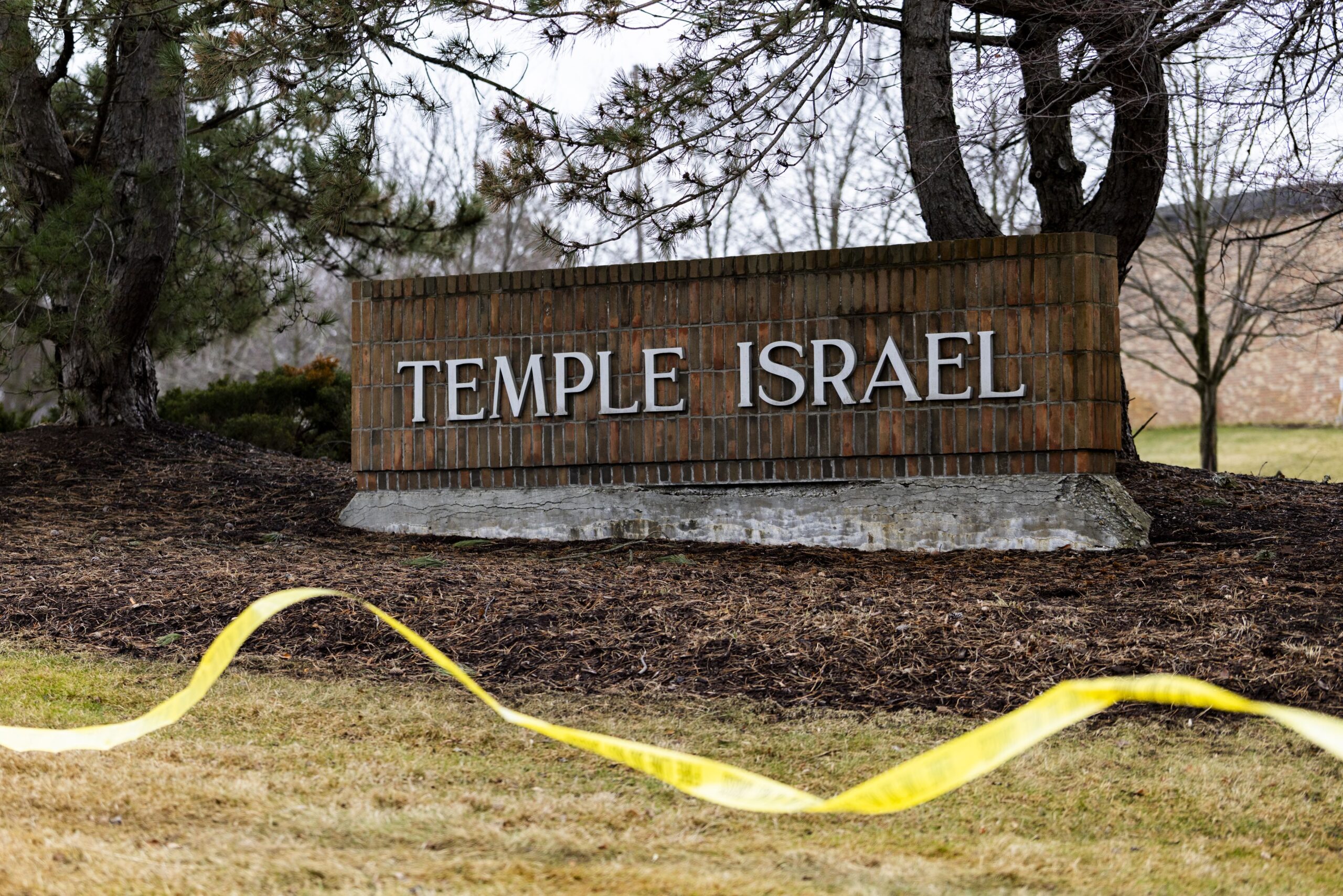<i>Emily Elconin/Getty Images via CNN Newsource</i><br/>Caution tape near the front entrance of Temple Israel