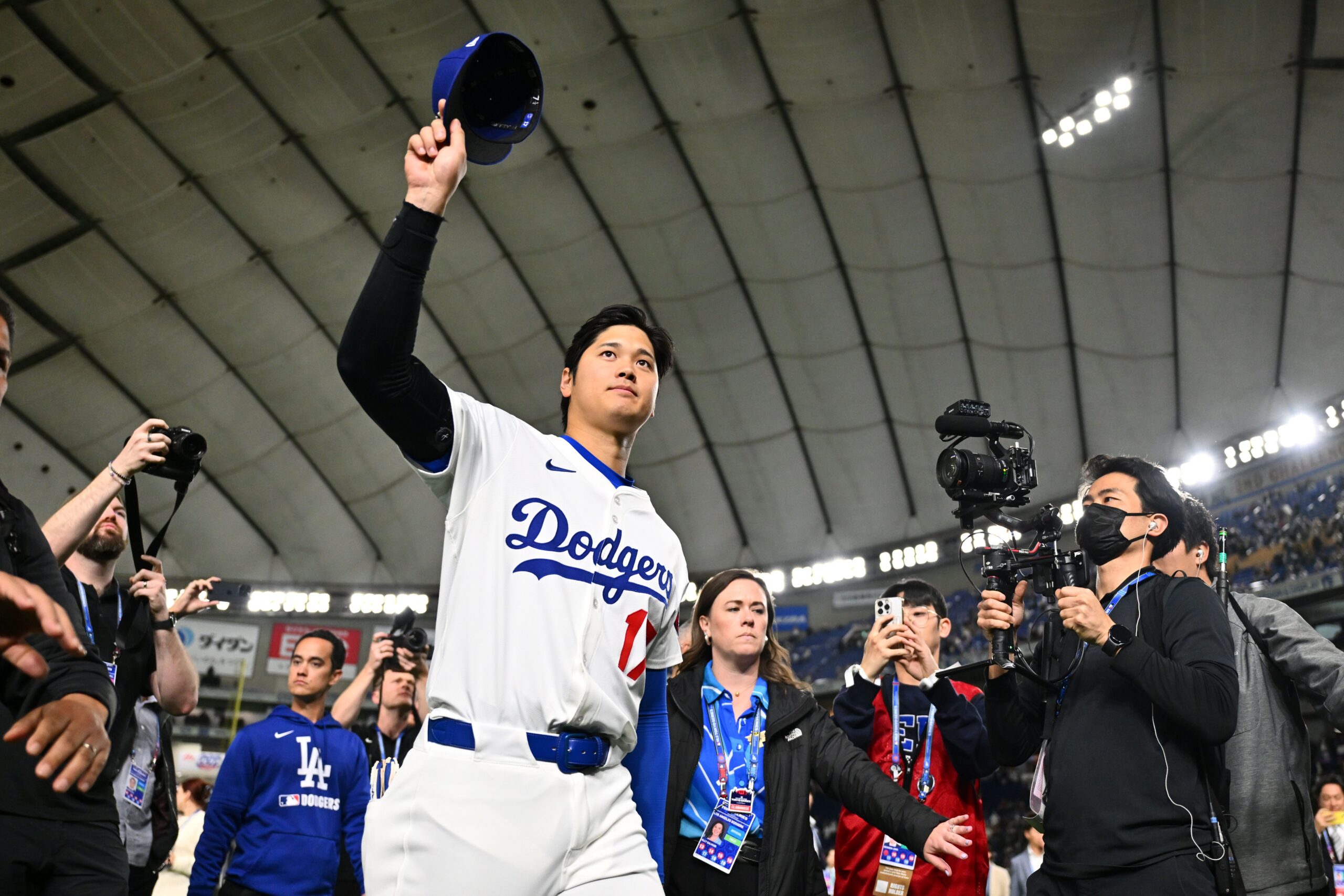 <i>Kenta Harada/Getty Images via CNN Newsource</i><br/>Los Angeles Dodgers star Shohei Ohtani acknowledges fans after the Tokyo Series that started the 2025 regular season.