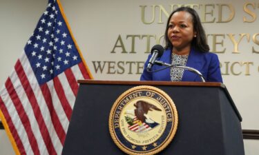 Assistant Attorney General Kristen Clarke of the Justice Department's Civil Rights Division speaks during a news conference Thursday