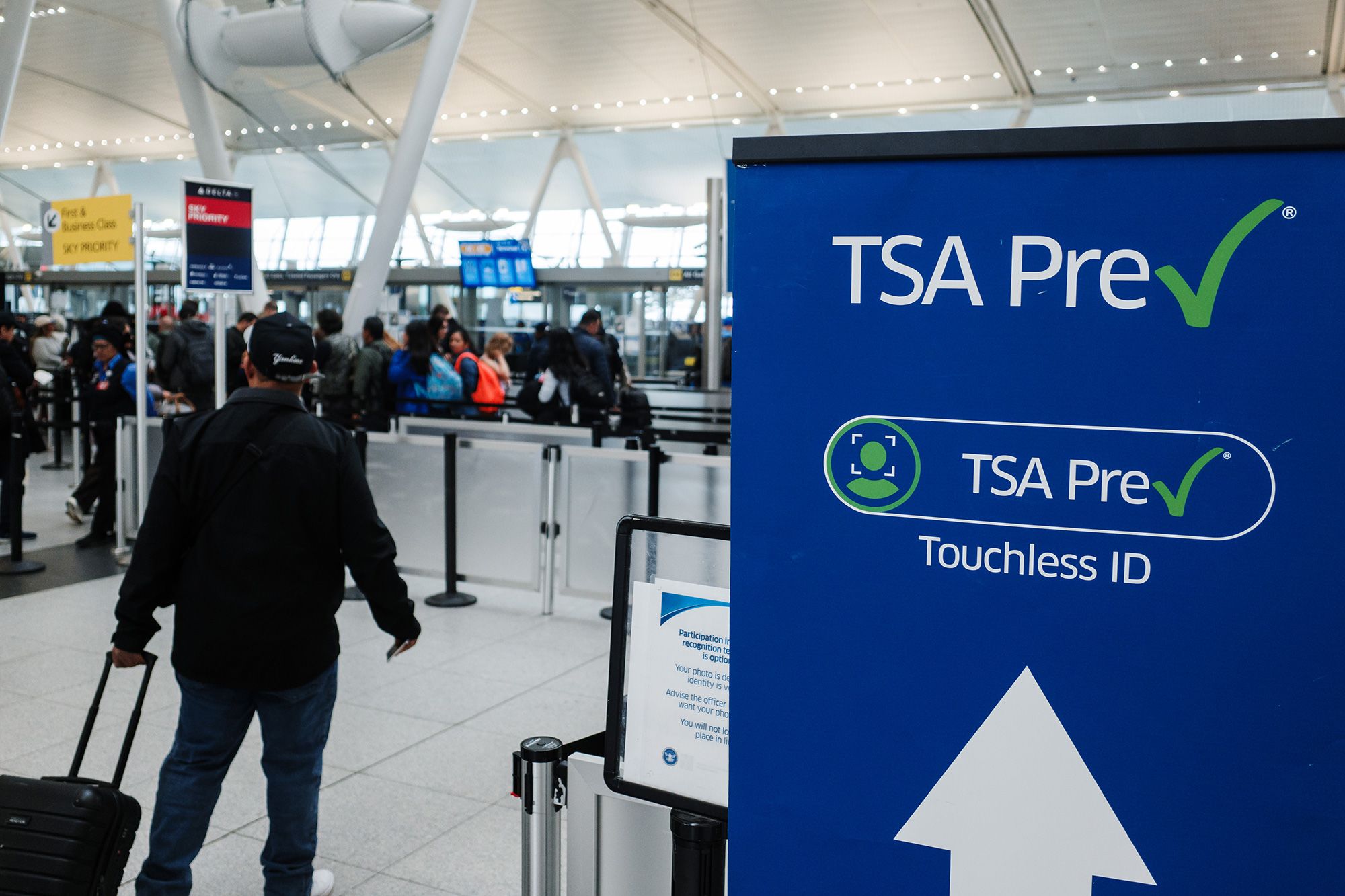 <i>Elijah Nouvelage/Reuters via CNN Newsource</i><br/>Passengers use Clear security screening machines at Hartsfield-Jackson Atlanta International Airport in Atlanta in 2022. The service is run by a for-profit company and while it offers some of the same advantages as TSA PreCheck