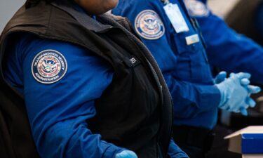 Volunteers helped distribute food with the Atlanta Community Food Bank for TSA officers on Friday.