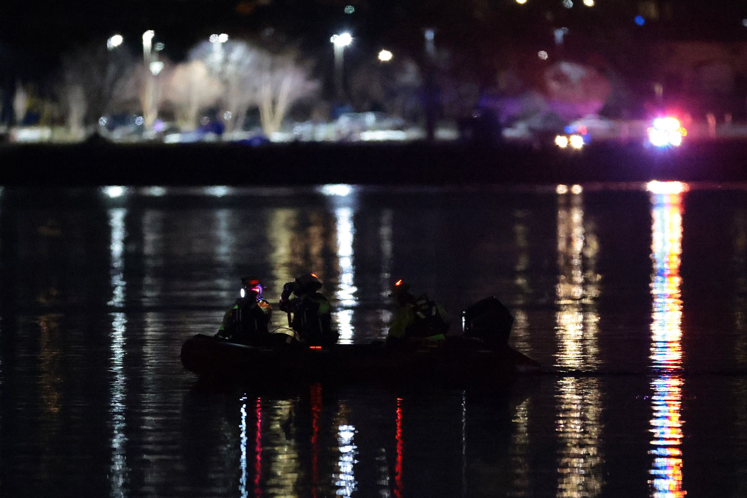 <i>Win McNamee/Getty Images via CNN Newsource</i><br/>Emergency response units conduct search and rescue operations in the Potomac River near Ronald Reagan Washington Airport on January 30.
