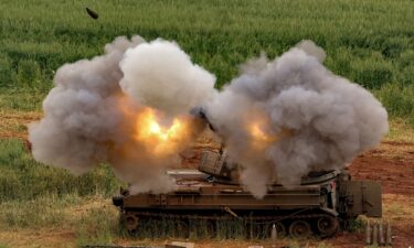 An Israeli self-propelled howitzer artillery gun fires rounds towards southern Lebanon from a position in the upper Galilee in northern Israel.