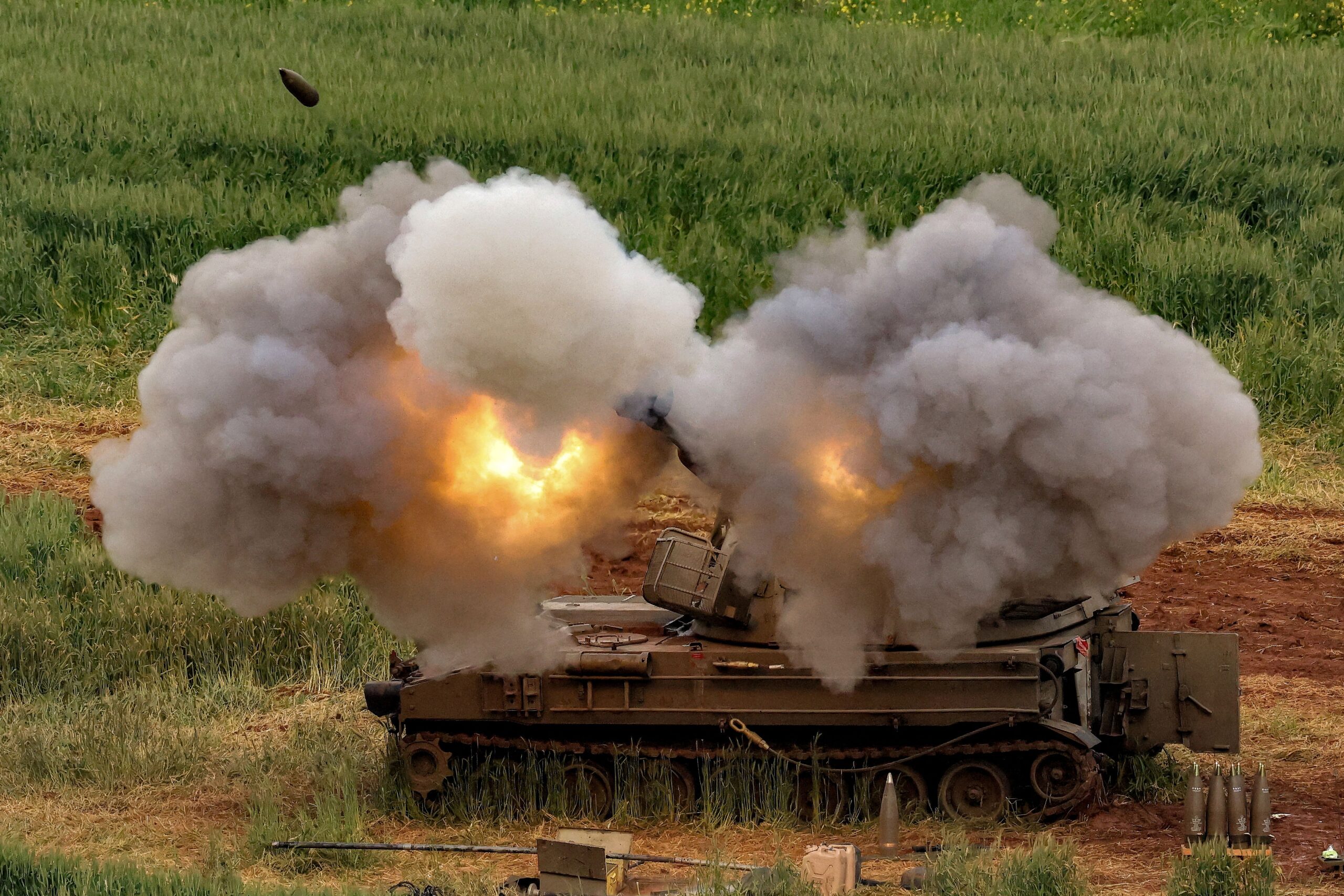<i>Jack Guez/AFP/Getty Images via CNN Newsource</i><br/>An Israeli self-propelled howitzer artillery gun fires rounds towards southern Lebanon from a position in the upper Galilee in northern Israel.