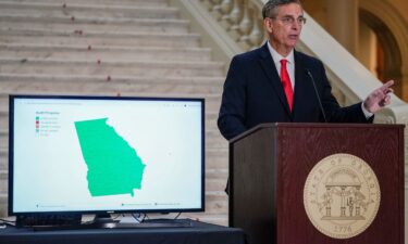 A transcript of a phone call between Donald Trump and Brad Raffensperger appears on a screen during a hearing of the Select Committee to Investigate the January 6th Attack on the US Capitol