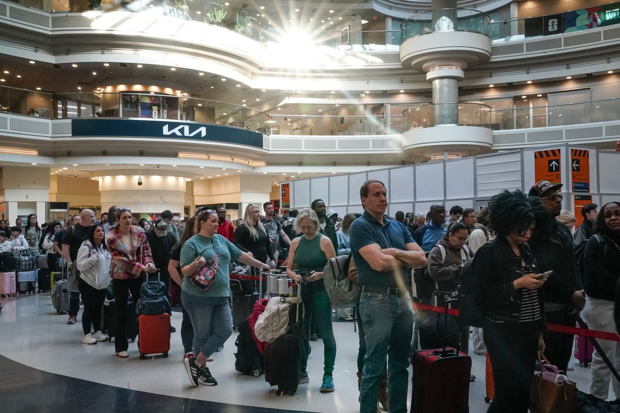 <i>Elijah Nouvelage/Bloomberg/Getty Images via CNN Newsource</i><br/>Travelers wait in line at a Transportation Security Administration checkpoint at Hartsfield-Jackson Atlanta International Airport (ATL) in Atlanta