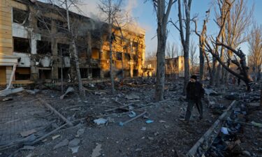Ukrainian servicemen look at a planning and correction module for Russian air glide bomb