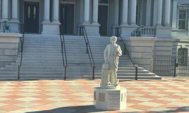 A replica of a statue of Christopher Columbus that once stood in Baltimore now stands outside the Eisenhower Executive Office Building next to the White House.
