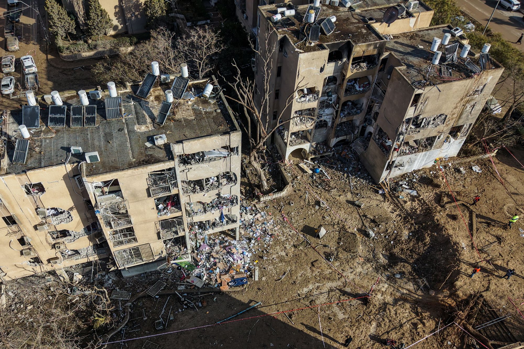 <i>Dedi Hayun/Reuters via CNN Newsource</i><br/>A drone view shows a crater in a residential neighbourhood
