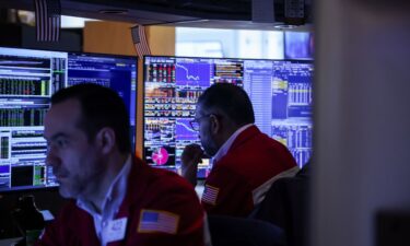 Traders work on the floor of the New York Stock Exchange on March 20.
