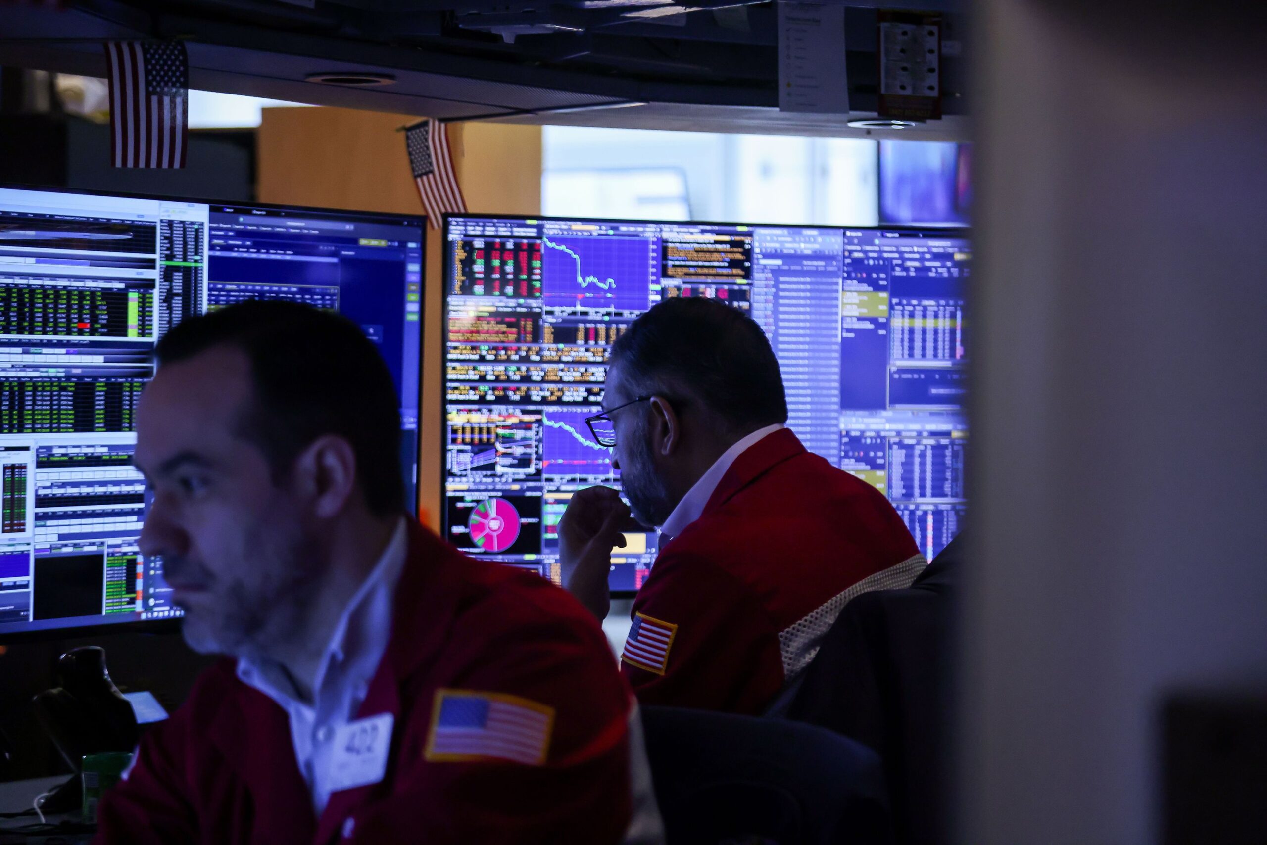 <i>Michael Nagle/Bloomberg/Getty Images via CNN Newsource</i><br/>Traders work on the floor of the New York Stock Exchange on March 20.