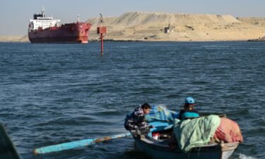 A bulk carrier sits anchored at a port in Oman earlier this month.