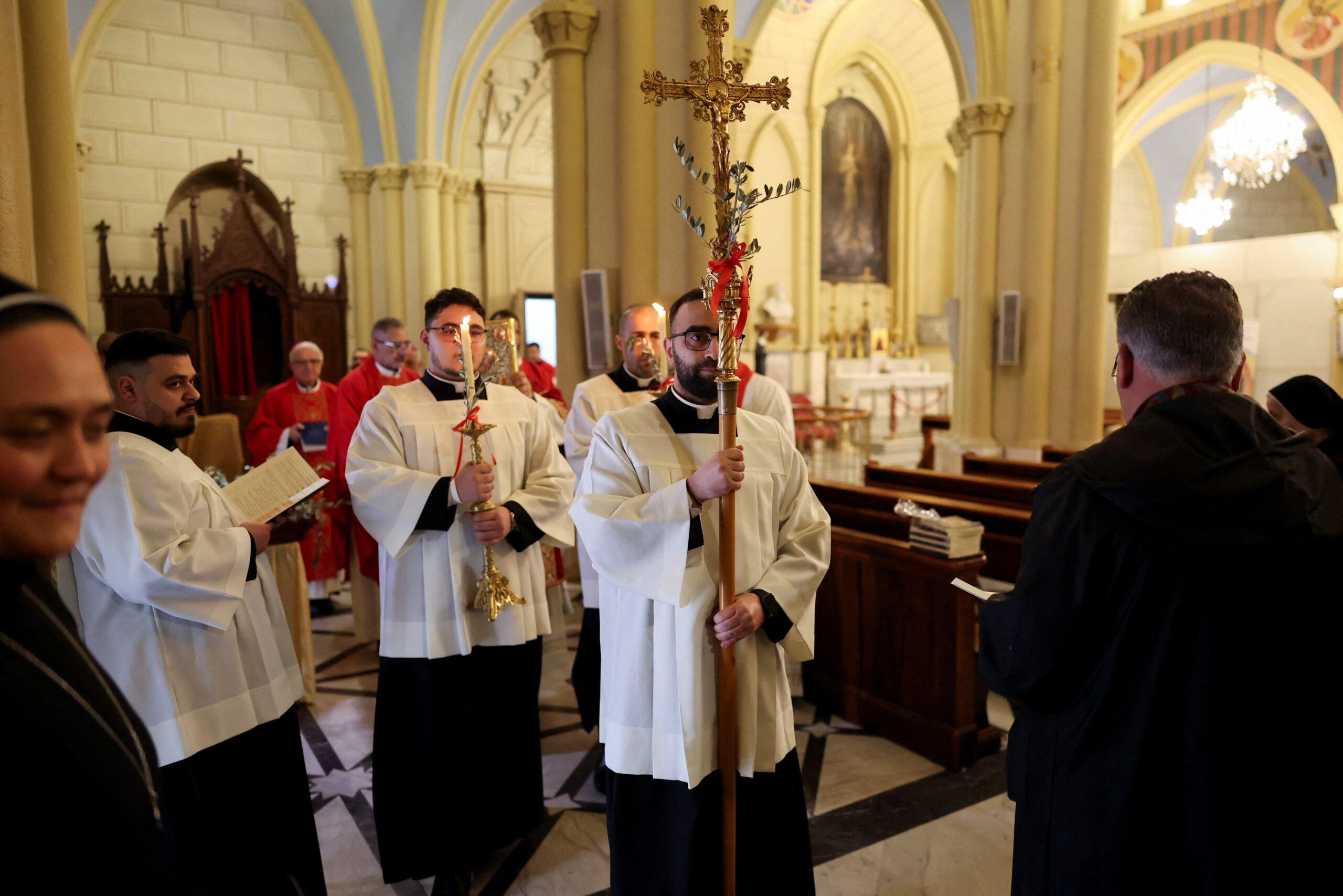 <i>Ammar Awad/Reuters via CNN Newsource</i><br/>Christian worshippers mark Palm Sunday