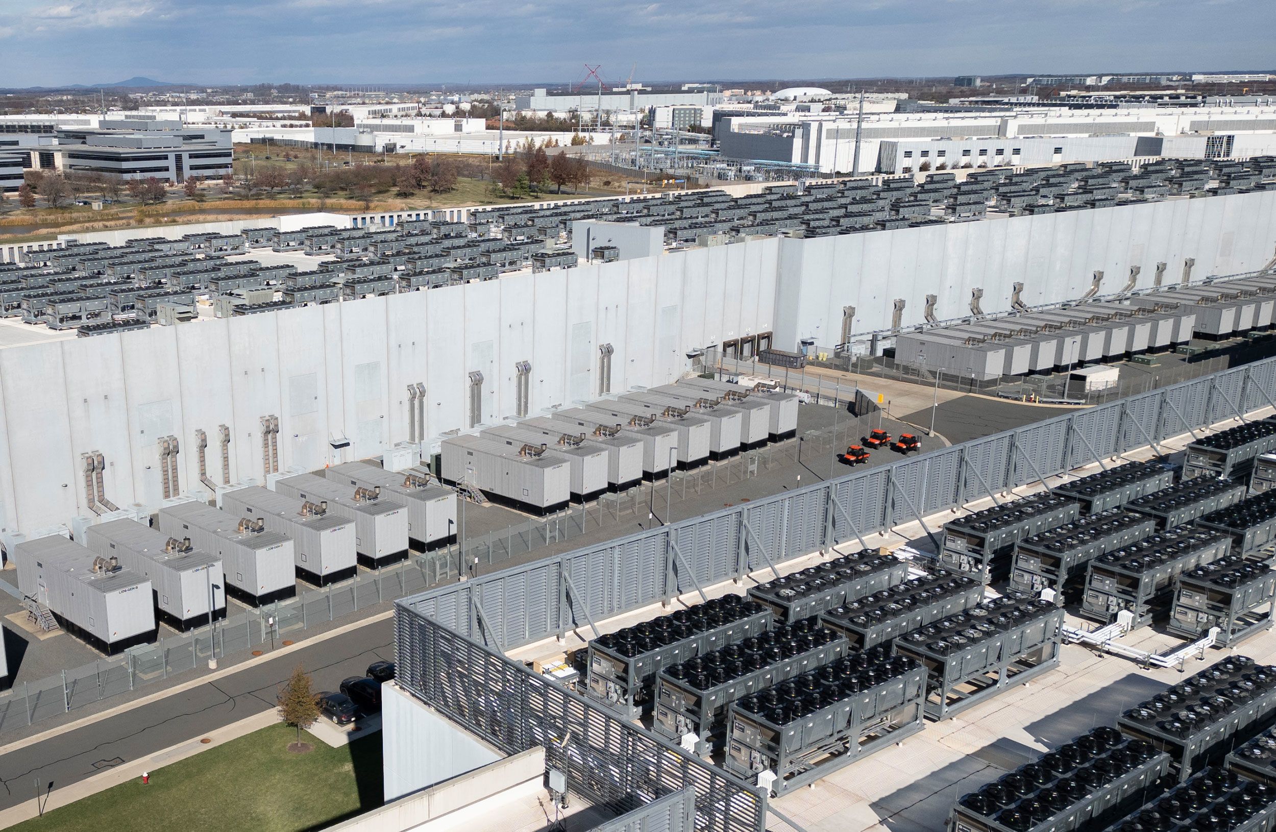 <i>Andrew Caballero-Reynolds/AFP/Getty Images via CNN Newsource</i><br/>Cooling vent fans on the roof of a Digital Realty data center in Ashburn