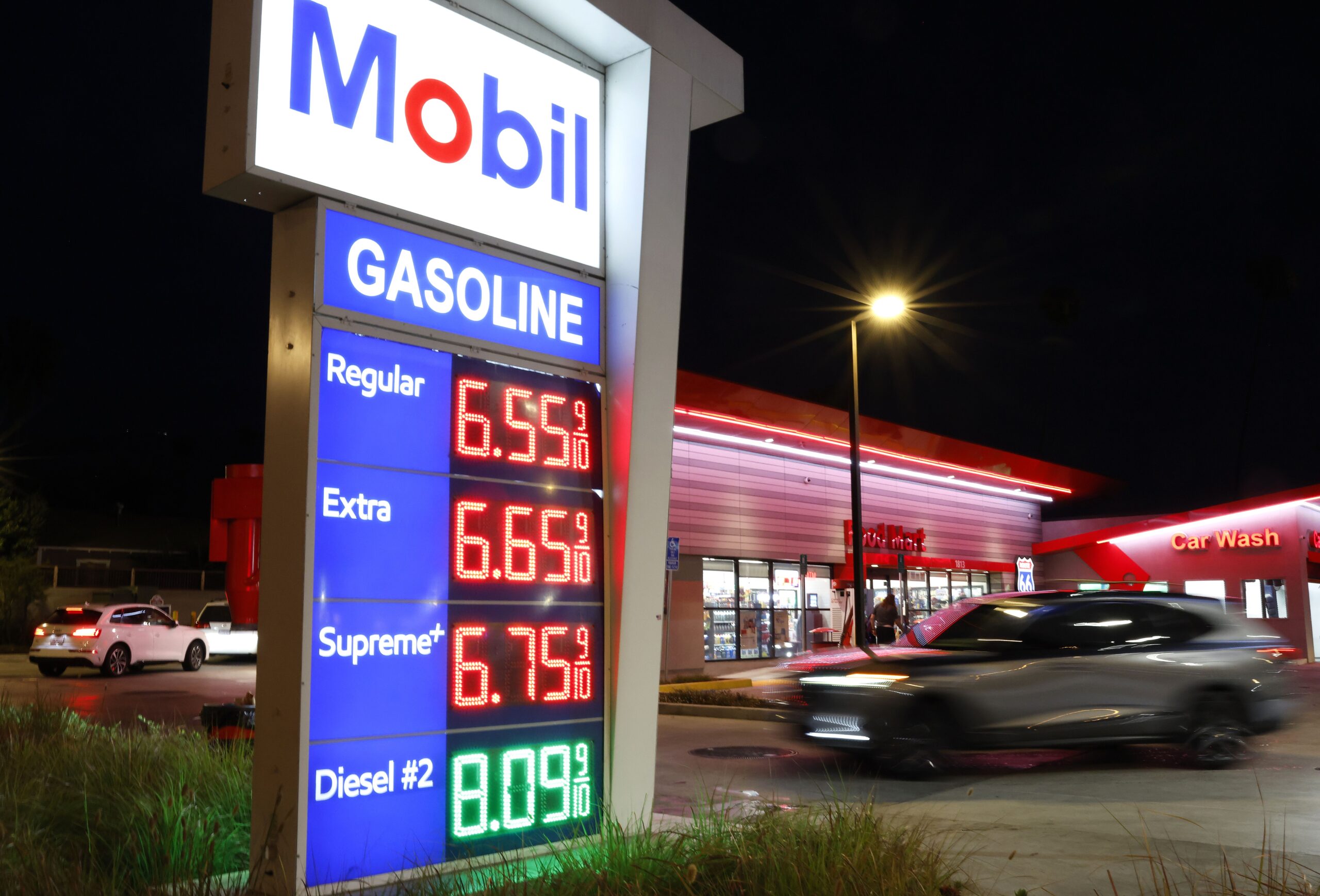 <i>Mario Tama/Getty Images via CNN Newsource</i><br/>Gas prices are displayed at a Mobil gas station in Pasadena